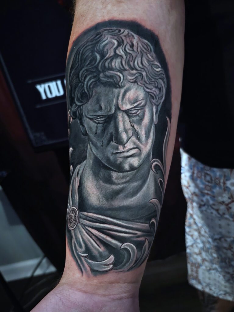 Marcel Tattoo